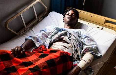 Ugandan police say gay rights activist in critical condition after knife attack
